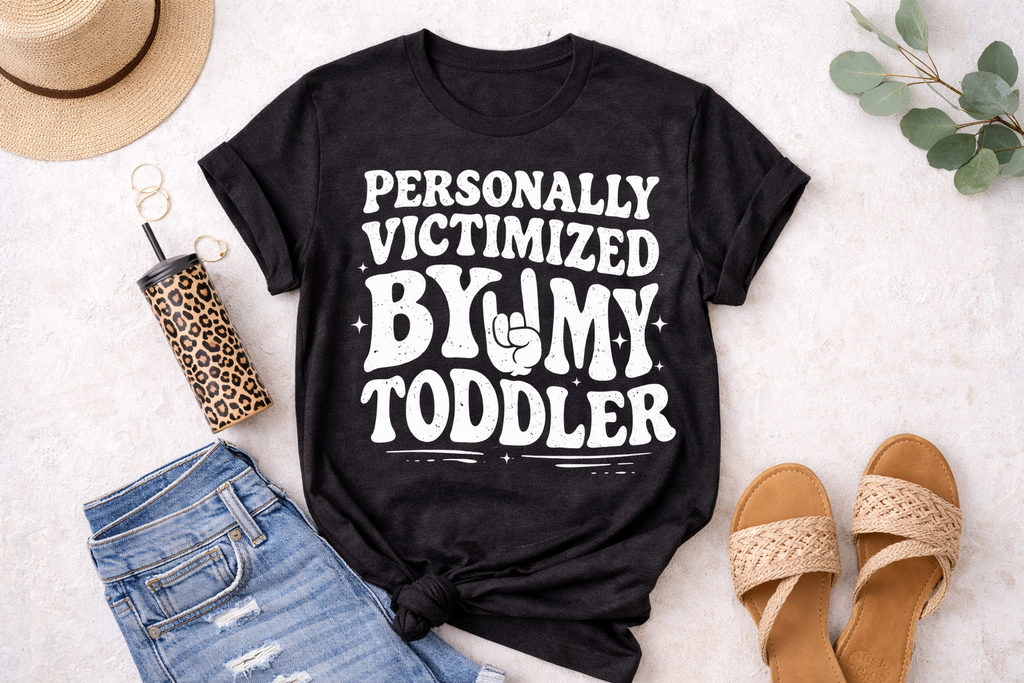 “Personally Victimized by My Toddler T-Shirt | Funny Mom Shirt | Relatable Parenting Tee | Mom Life Humor Graphic Tee”